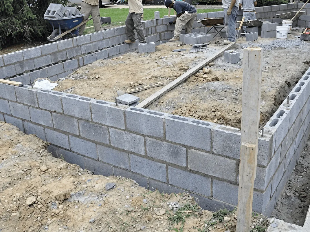 Professionals building a foundation with blocks in Erie, PA